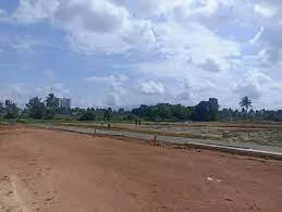 Levelled and graded land at a plotted development site, photograph
